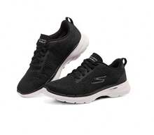 Skechers Women's Lightweight Comfortable Breathable Shock-Absorbing Supportive Walking Shoes - Black and White - View 2