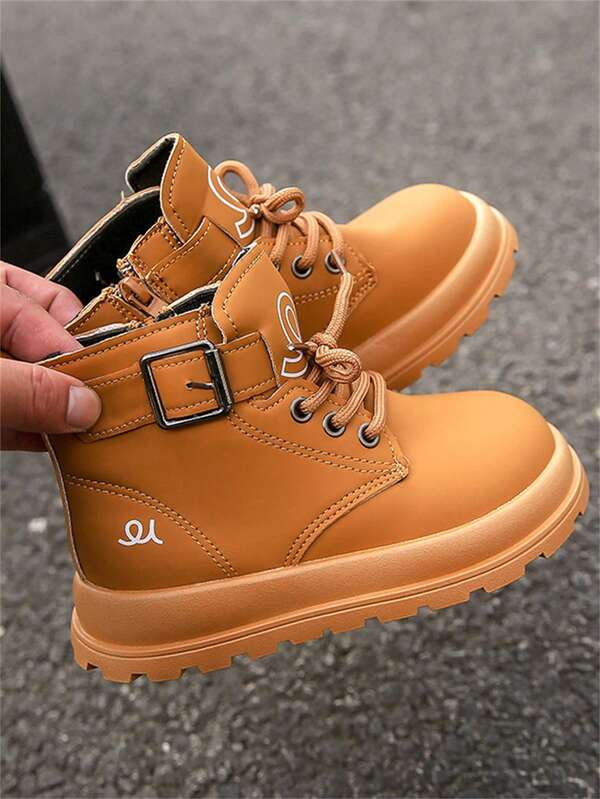 Un par de botas para niños, nuevas para otoño, estilo británico, botas cortas negras para niños, botas amarillas de suela blanda para niñas