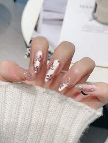 优雅浪漫，10 件短杏仁手工按压指甲套装，粉色全覆盖假指甲，繁花似锦，可拆卸和重复使用，包含 1 件果冻胶和 1 个指甲锉，适合女士和女孩，日常、办公室、情人节礼物。美甲用品 - 粉色 - 查看 2