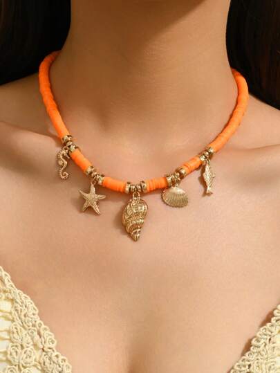 1pc Fashionable & Elegant Bohemian Style Necklace With Ocean Elements - Gold Starfish, Gold Coral, Gold Seashell, Seahorse, Small Fish, Seed Beads, Ceramic Painted Hearts, Clover, Gold Glass Rhinestone Heart, Bow Knot, Baroque Pearl, Blue & White Porcelain, White Rice Beads, Multi-Pendant Design, Suitable For Party, Holiday, Wedding, Prom, Music Festival Or Any Occasions. Please Note That Due To The Handpainted Ceramic Beads, There May Be Slight Variations Or Uneven Painting Which Is A Normal Characteristic.