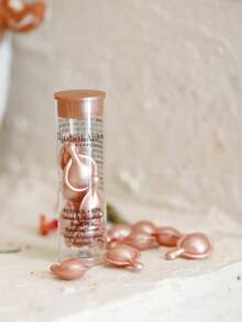 Elizabeth Arden [Mini] Retinol + HPR Ceramide Capsules Rapid Skin Renewing Serum 3.2ml / 7-Piece / Visibly Reduces Wrinkles In 7 Days1 Without Irritation2 And Leaves Skin With Improved Texture And Tone. Gentle Formula Can Be Used Day And Night. Our Retinol Capsules Are Sealed To Keep Light & Air Out To Ensure This Is The Freshest, Most Potent Form Of Retinol Without A Prescription. - Pink 3.2ml/7-piece - View 3