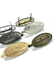 DIY手工纽扣、包袋配件、装饰性logo纽扣、行李箱五金配件、DIY手工包袋金属徽章、行李箱金属铭牌、金属“手工”斜体服装标签、手工服装及包袋字母标签、多色椭圆形合金手工标签、缝纫工艺配件、服装、牛仔裤、鞋子、包袋手工标签 - 彩色 - 查看 4