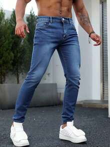 Jeans skinny para hombre en denim azul claro, ajustados y modernos, ideal para estilos casuales - Azul lavado medio - Ver 1