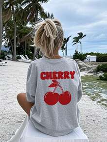 Ta luźna koszulka z krótkim rękawem i okrągłym dekoltem w wiśniowy wzór została zaprojektowana specjalnie dla dziewczynek i dzieci na lato. Wyróżnia się pysznym wzorem wiśni. To wyjątkowa koszulka dla dzieci, które kochają wiśnie i chcą się wyróżnić! Odzież dziewczęca, Koszulka z grafiką dla dziewcząt, Bluzka letnia, Odzież dziewczęca - Szary - Zobacz 4