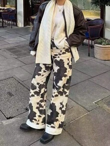 休闲复古牛皮印花裤