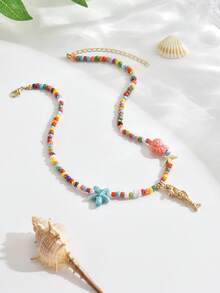 1件优雅可爱的波西米亚海洋元素陶瓷鱼、海星、金海螺、金贝壳、五彩种子珠、水钻、金鱼、橙色/黄色/绿色/红色等。多款可选女士多层串珠项链，海滩派对项链，精致欧式风格，适合日常佩戴，毕业/返校礼物。实际混合种子珠颜色可能与官方照片有所不同，这是由于高温陶瓷绘画工艺和轻微瑕疵造成的正常现象。 - 彩色 - 查看 20