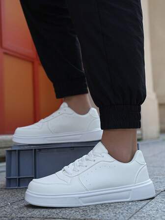 "Minimalist White Casual Sneakers - Timeless Look, Fits Jeans/Dresses, Popular Among Teens & Adults"