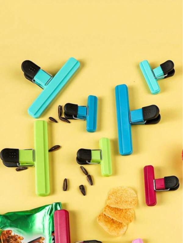2 pièces Pinces à notes, Pinces à sacs plastiques, Pinces de scellage réutilisables, étanches, anti-poussière et gaine fraîche. Boîte de rangement et accessoires de cuisine, couleurs aléatoires, les défauts mineurs n'affecteront pas l'utilisation.