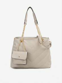 绗缝双隔层包，配有手柄和可调节肩带，附赠一个口袋