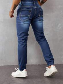 Jeans skinny para hombre en denim azul, ajustados y modernos, ideal para estilos casuales - Azul lavado medio - Ver 2