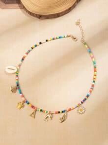 1 pieza Collar de cuentas de plástico de colores con colgante con letra, collar de estilo bohemio con tema oceánico de verano en la playa con encantos de pez, tortuga, concha, delfín, camarón, margarita, con cierre de langosta dorado ajustable para usar cómodamente, adecuado para todo el día, regalo ideal para madre, esposa, hermana o amiga en cumpleaños, aniversario o Navidad