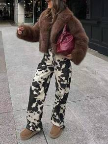 休闲复古牛皮印花裤