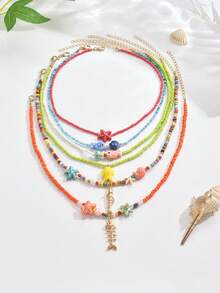 1件优雅可爱的波西米亚海洋元素陶瓷鱼、海星、金海螺、金贝壳、五彩种子珠、水钻、金鱼、橙色/黄色/绿色/红色等。多款可选女士多层串珠项链，海滩派对项链，精致欧式风格，适合日常佩戴，毕业/返校礼物。实际混合种子珠颜色可能与官方照片有所不同，这是由于高温陶瓷绘画工艺和轻微瑕疵造成的正常现象。 - 彩色 - 查看 3