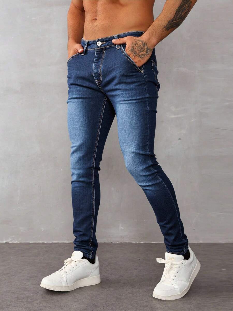 Jeans skinny para hombre en denim azul, ajustados y modernos, ideal para estilos casuales - Azul lavado oscuro - Ver 1