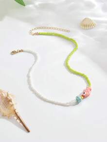 1件优雅可爱的波西米亚海洋元素陶瓷鱼、海星、金海螺、金贝壳、五彩种子珠、水钻、金鱼、橙色/黄色/绿色/红色等。多款可选女士多层串珠项链，海滩派对项链，精致欧式风格，适合日常佩戴，毕业/返校礼物。实际混合种子珠颜色可能与官方照片有所不同，这是由于高温陶瓷绘画工艺和轻微瑕疵造成的正常现象。 - 彩色 - 查看 21