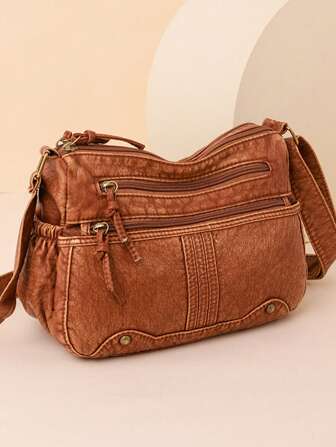 复古多拉链斜挎包，牛仔轻便斜挎包。休闲时尚百搭单肩包，适合购物、钱包、逛街、年轻女性、大学生、新人、白领人士。非常适合办公室、大学、工作、商务、通勤、户外活动、旅行和郊游。