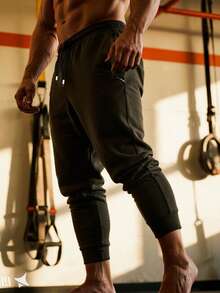 Men's Casual Sports Pants, Soft And Comfortable, With Zipper Pockets And Adjustable Drawstring, Suitable For All Seasons. Solid Color Design, Casual And Versatile, Ideal For Outdoor Running, Camping And Hiking.