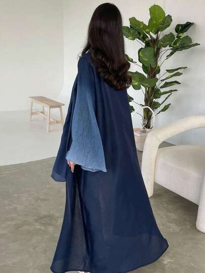 女士蓝色前开式长袍 - 袖口褶饰，适合端庄时尚穿着