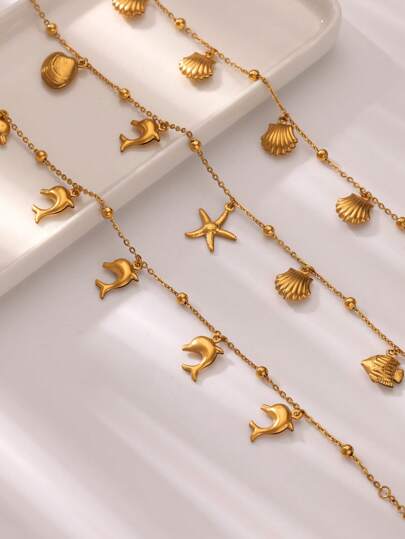 1 pieza Tobillera de acero inoxidable con delfín, estrella de mar y conchas, accesorio de playa de verano para mujer, color dorado, pulsera de pierna, regalos de bodychain
