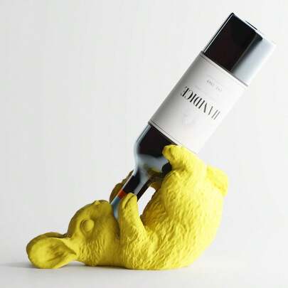 ORIZZONTE Porta-garrafas decorativo em forma de coelho em estilo divertido - Porta-vinhos, design irônico para cozinha, mesa, bar ou presente original para amantes de vinho, 27 * 11,9 * 16,3 cm, 100% fabricado na Itália