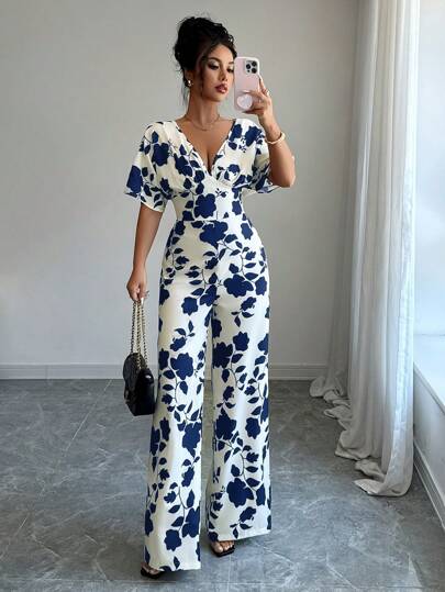 Mono informal de pierna ancha y suelta con amarres en la cintura, de talle alto, con estampado en blanco y negro, de corte asimétrico y fruncido, para usar en el trabajo