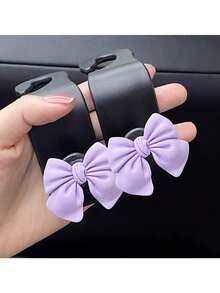 Ganchos para coche con forma de lazo, creativos y adorables colgadores para respaldo de asiento para almacenamiento interior del coche, gancho colgante multifuncional para decoración de coche - Unitalla - Ver 11