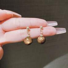 1 par de pendientes de piedra con forma de ojo de gato de estilo vintage sencillo, de moda y versátil para uso diario