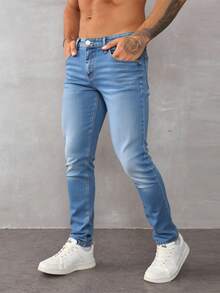 Jeans rectos para hombre en denim azul claro, ajustados y versátiles, ideal para estilos casuales - Azul lavado medio - Ver 1