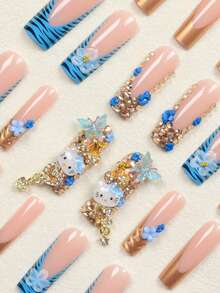 24 件长款棺材指甲贴，Sanrio 蓝色条纹法式 Hello Kitty，蓝色花卉和蝴蝶金色闪光贴花套装，含 1 件指甲胶和 1 个角质层推刀，适合女性日常、派对、活动 - 彩色 - 查看 3