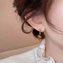 1 par de pendientes de piedra con forma de ojo de gato de estilo vintage sencillo, de moda y versátil para uso diario