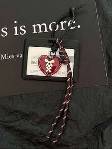 丝带蝴蝶结爱心卡包 适用范围：地铁卡 公交卡 火车票 轮渡卡 员工证 门禁卡 学生证 借书证 校园餐卡 女士钱包 迷你钱包 零钱包 卡包