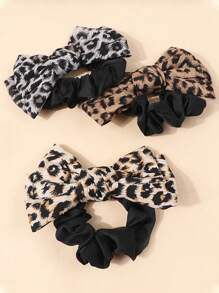 女士豹纹蝴蝶结发圈，织物材质时尚配饰，适合日常、外出、派对、时尚、发圈、发圈、发饰、休闲