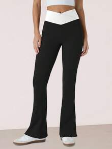 RUNONWHEELS 5 女士瑜伽裤，收腹提臀，撞色V腰喇叭裤腿设计，前片无缝，高腰交叉设计，塑形舒适，适合日常穿着。 - 黑與白 - 查看 6