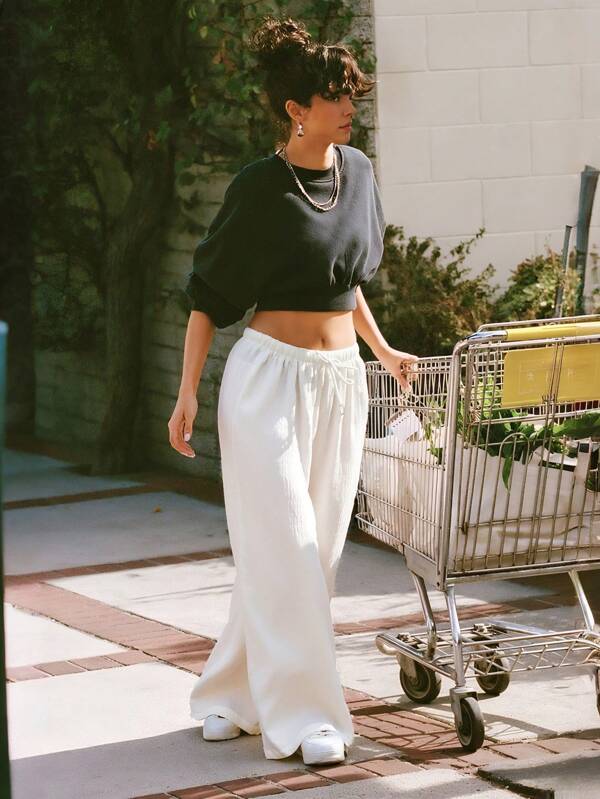 Pantaloni a gamba larga con coulisse, tinta unita, eleganti e casual da donna, modello giovane