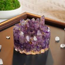 [6-7厘米天然水晶柱碗] 透明光泽的水晶石材质，可用作精致的烛台、手链首饰收纳盒和家居装饰品。也可在日常生活中用作水晶清洁工具。