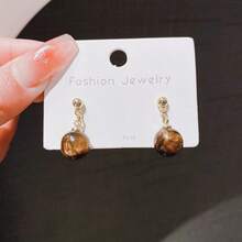 1 par de pendientes de piedra con forma de ojo de gato de estilo vintage sencillo, de moda y versátil para uso diario