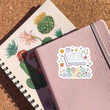 3-Inch "Bookaholic" Sticker - Whimsical Book - Themed Vinyl Sticker With Colorful Floral & Book Illustration For Laptops, Notebooks, Water Bottles, Reading Nooks, And Book Lover Spaces | Great For Bibliophiles, Bookworms, Literary Enthusiasts, And Cute Decor Fans | Perfect For Showcasing Book Fandom, Adding Playful Flair, And Celebrating Reading Magic | Charming Sticker For Book - Related Adventures, Cozy Reading Vibes, And Whimsical Decor