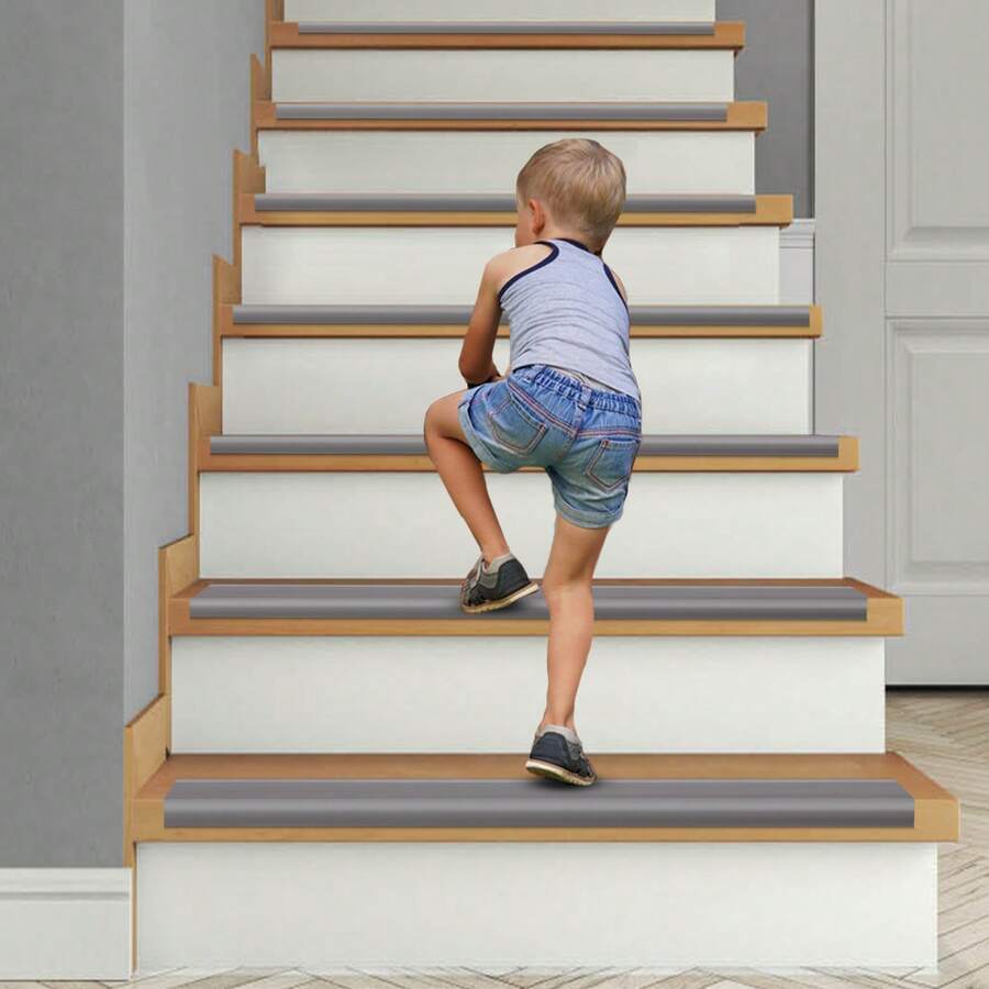 Tira de escalera antideslizante de 10 m, tira de borde de escalera autoadhesiva, tira de borde de escalón de PVC flexible - Gris - Ver 1