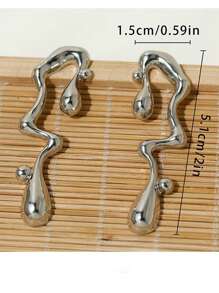 1 par de Pendientes asimétricos exagerados con notas musicales, estilo europeo y americano