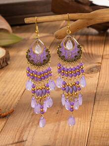 一对波西米亚复古风耳环，饰有雕刻图案和油滴状细节，泪滴形流苏由串珠制成。适合女性在节日和庆典期间佩戴。 - 紅色 - 查看 7