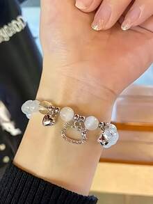 5 piezas, pulsera con encanto de  oficialmente autorizada por  - Estilo Y2K E y accesorio Kawaii elástico, que incluye colgante con forma de corazón, alas de ángel y llave, cristal sintético de piedra natal de agosto, lindo regalo de dibujos animados, uso diario del Día de San Valentín para niña, colgante de pulsera de , joyería diaria, accesorios para fiestas, diseño divertido, decoración de cuentas, regalo para cumpleaños, pendiente con diseño de perlas, accesorio para niñas - Multicolor - Ver 9