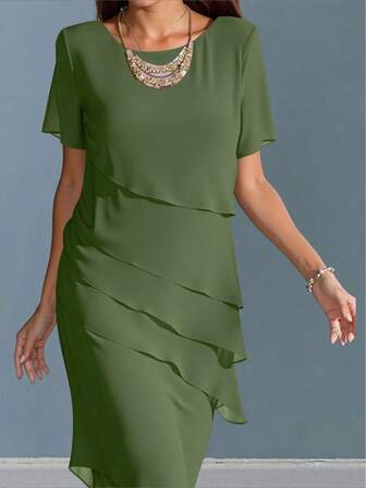 女士优雅休闲雪纺连衣裙，纯色短袖圆领飘逸荷叶边下摆宽松腰身设计，透气垂坠，适合办公室、派对和日常穿着，秋冬季款。