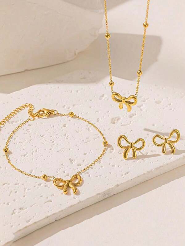 Conjunto de 3 elegantes joyas de acero inoxidable con diseño de lazo, ideal para uso diario, como regalo.