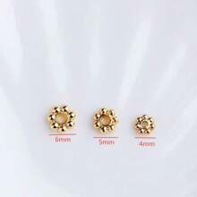 50 قطعة من تصميم عجلة الأقحوان من الفولاذ المقاوم للصدأ مع وسادات الخرز الفضفاضة، مطلية بالذهب عيار 18 قيراط للاكسسوارات DIY، مع وسادات الخرز