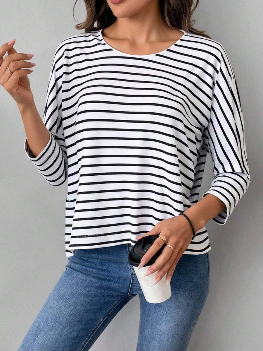 Blusa holgada amplia tejido suave rayado dama mujer cuello redondo manga tres cuartos bajo asimétrico casual día noche comida jardín cena playa calor primavera verano calle diario - Blanco y Negro - Ver 1