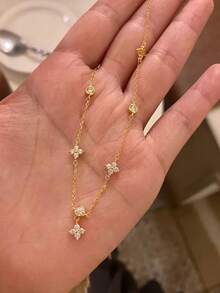 1 件女式铜镶嵌锆石四叶流苏项链，日常分层配饰礼物（四叶草吊坠数量随机） - 金黃色 - 查看 4