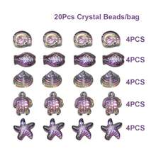 20 pièces/Paquet 5 styles (4 pièces chacun) Petits pendentifs en verre électroplaqué en forme de poisson, étoile de mer, tortue, escargot, coquille pour la création de bijoux, boucles d'oreilles, colliers, sangles de téléphone, porte-clés, décoration de voiture - Poisson Étoile Tortue Coquille Escargot - Voir 12