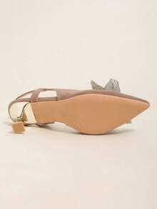 1 paire d'élégants talons hauts à bout pointu, matériau aspect avec décoration nœud strass, talon carré doré, convient pour le mariage