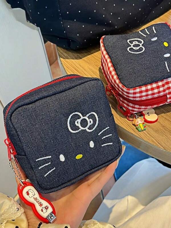 Sanrio 1 pieza Bolsa de cámara azul de vaquero Hello Kitty, bolsa de maquillaje portátil, nueva bolsa linda de almacenamiento para hombres y mujeres, bolso de viaje de cable de datos, estuche de mano, artículo esencial de viajes para cámara digital