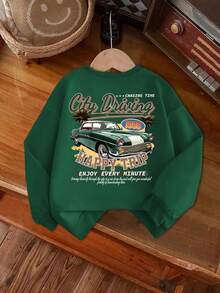 这款男童长袖圆领卫衣印有“卡通汽车和标语”图案，舒适时尚，休闲百搭，是秋冬季的理想之选。